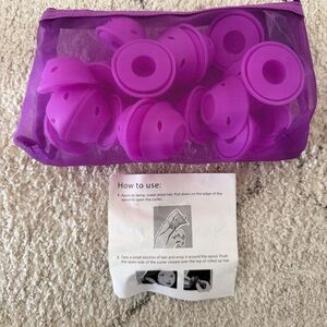 Set of purple silicone hair curlers 

Never used perfect condition